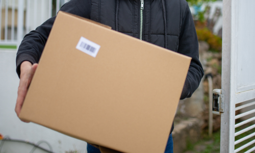 Man carrying cardboard box