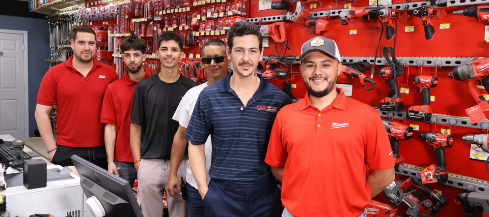 Baro Hardware staff standing in front of Milwaukee tool selection